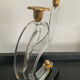 Pair of Hollywood Regency candlesticks in lucite and brass