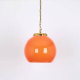 Orange glass pendant light by Peill Putzler, Germany, 1970.