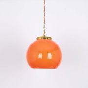 Orange glass pendant light by Peill Putzler, Germany, 1970.