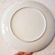 Vintage Japanese decorative plate with chrysanthemum and bird patterns.