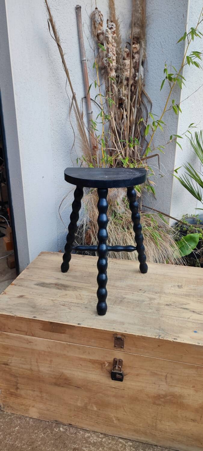 Low black stool