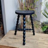 Low black stool