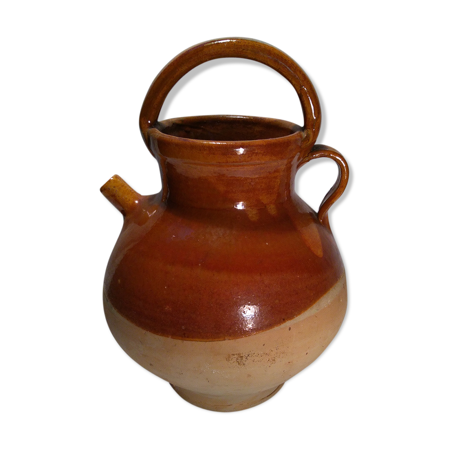 Old glazed earth jug