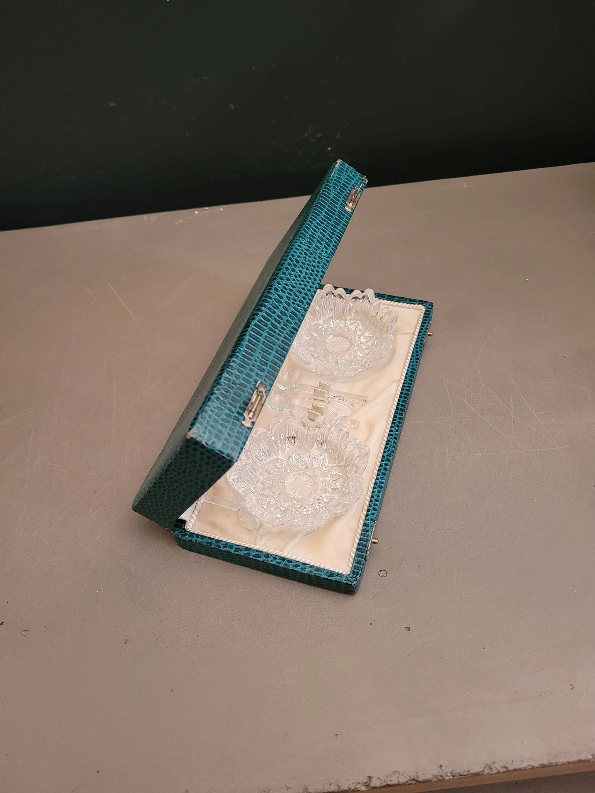 Pair of crystal salt cellars with spoons