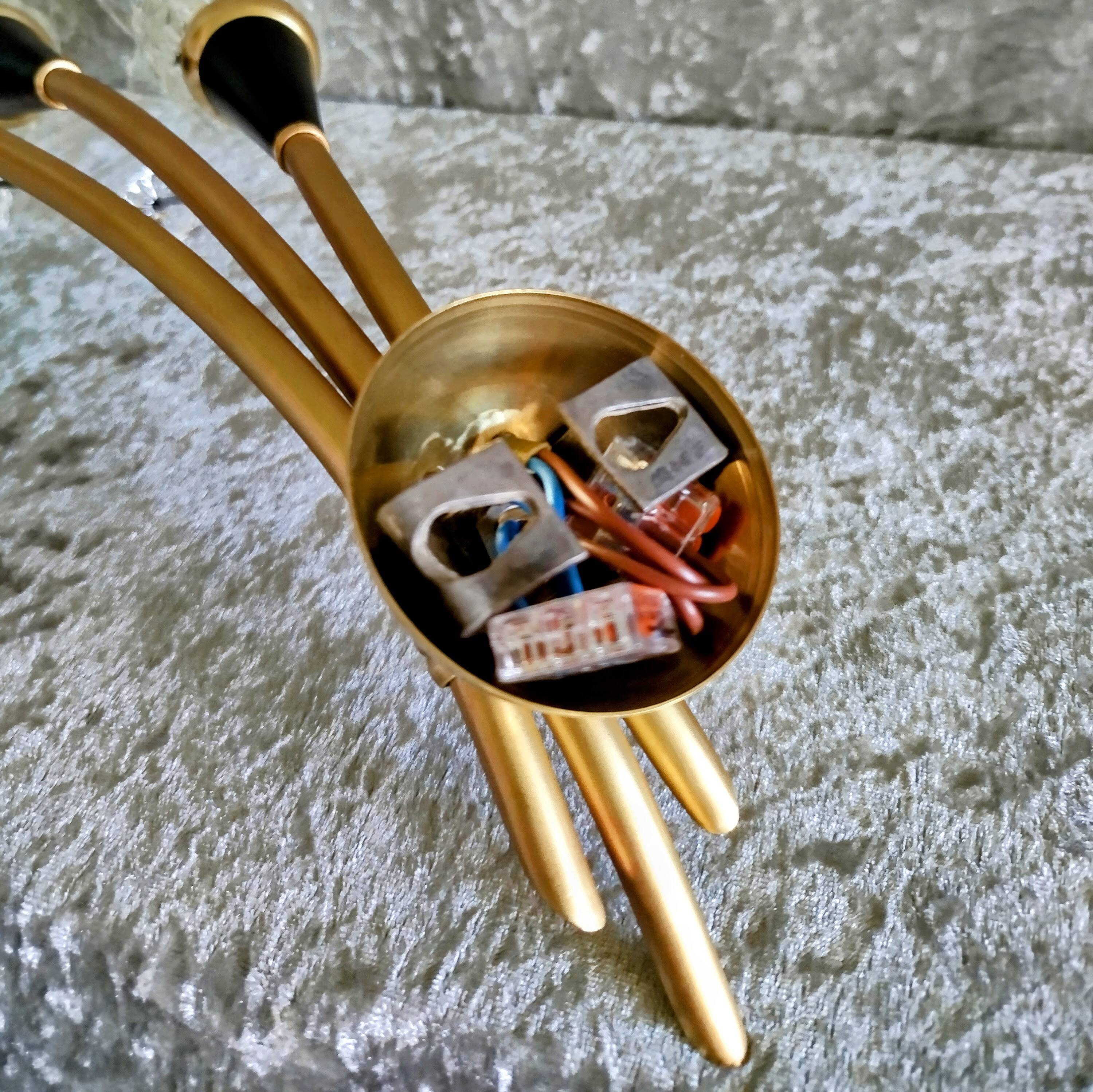 Pair of Lunel wall lights in brass and glass