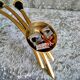Pair of Lunel wall lights in brass and glass