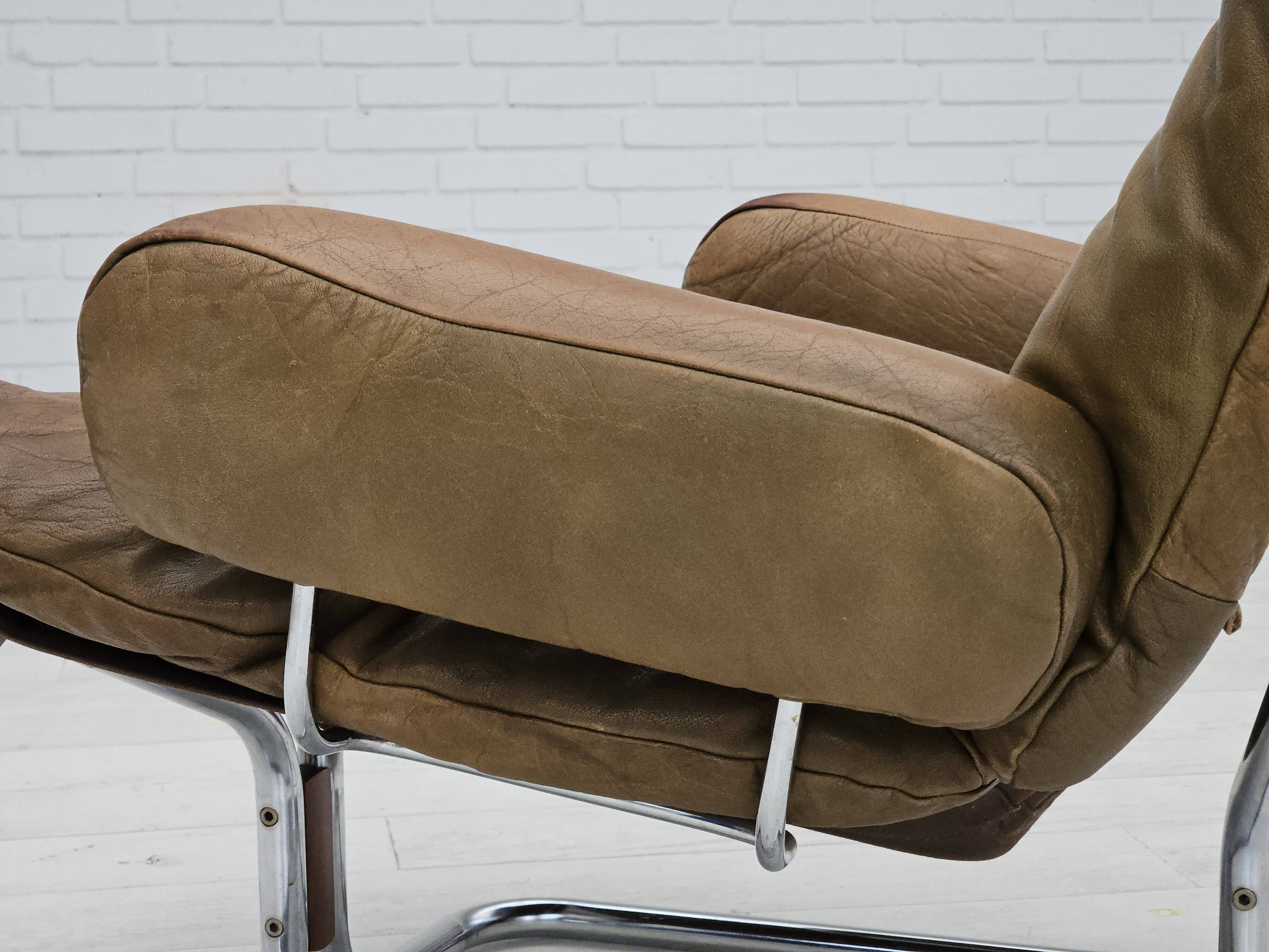 1970s, Norwegian design by Harald Relling, original condition, leather, chrome steel, teak wood.