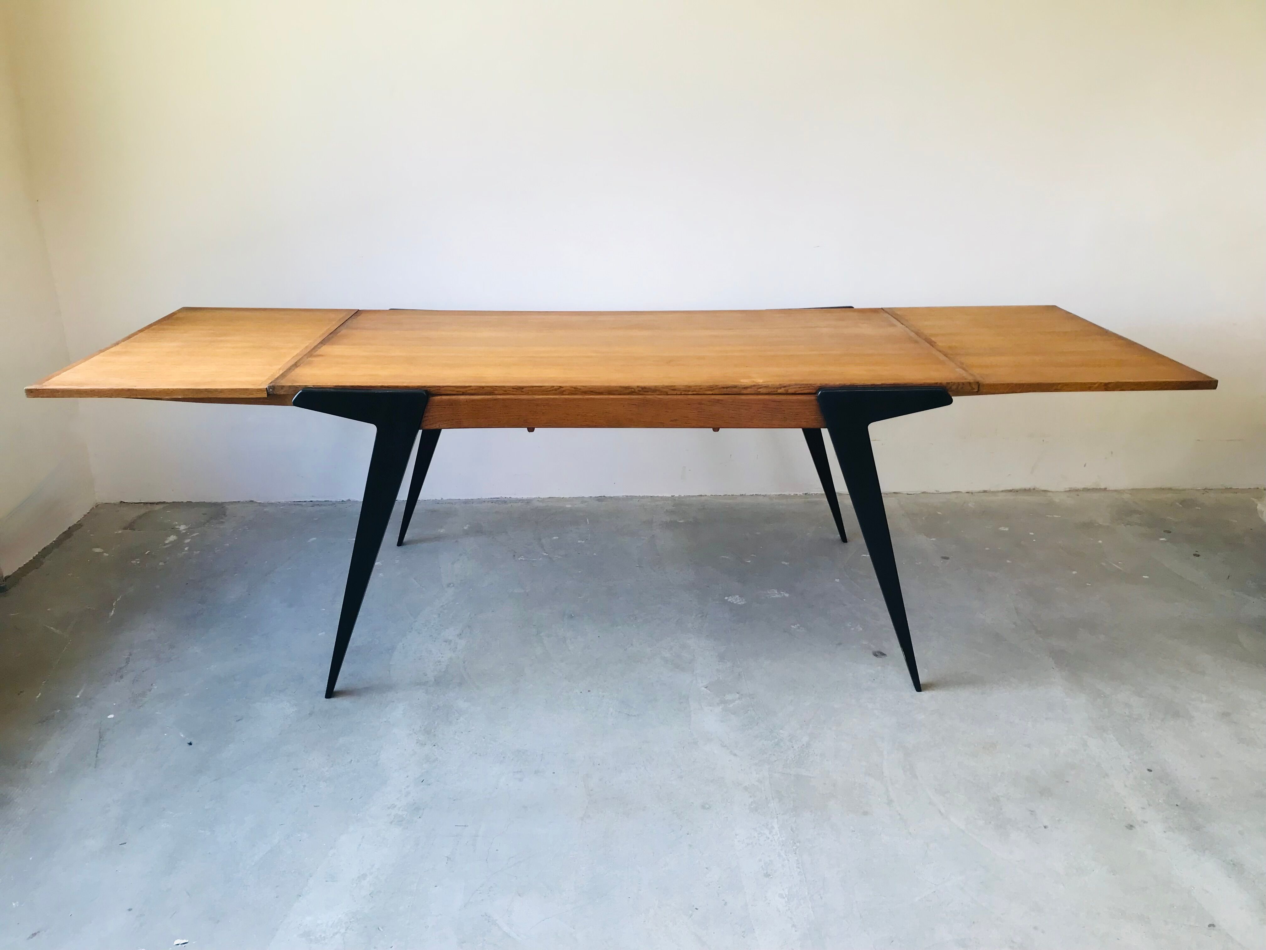Extendable dining room table, circa 1950