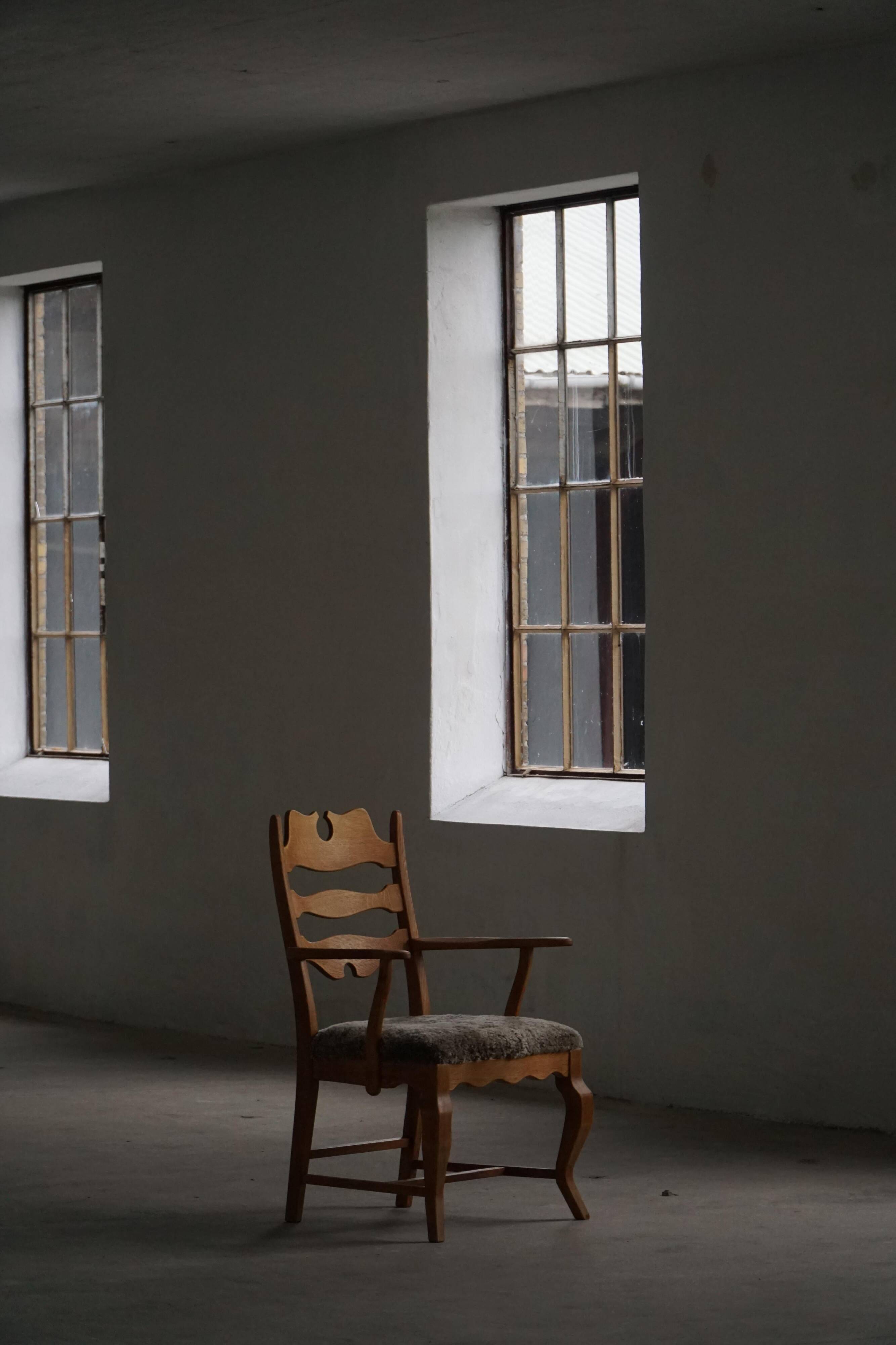 Razorblade armchair from the mid-20th century by Henning Kjærnulf, oak and lambswool, 1960.