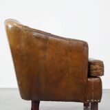 Stylish armchair made of cowhide leather with a unique design and beautiful finish