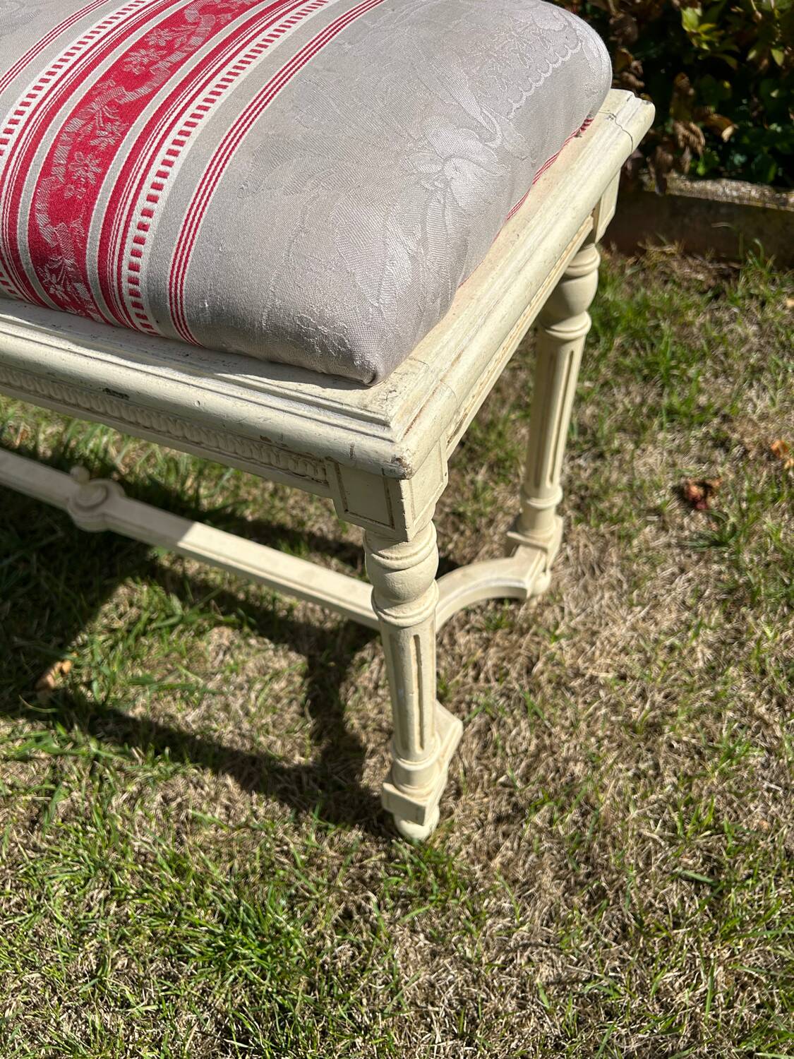 Louis XVI style bench at the end of the bed