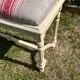 Louis XVI style bench at the end of the bed