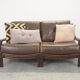Mid century vintage boho 2-seater sofa with leather cushions