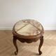Oval coffee table in Louis XV style made of onyx and solid wood.