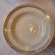 Table service in opaque porcelain with gold leaf.