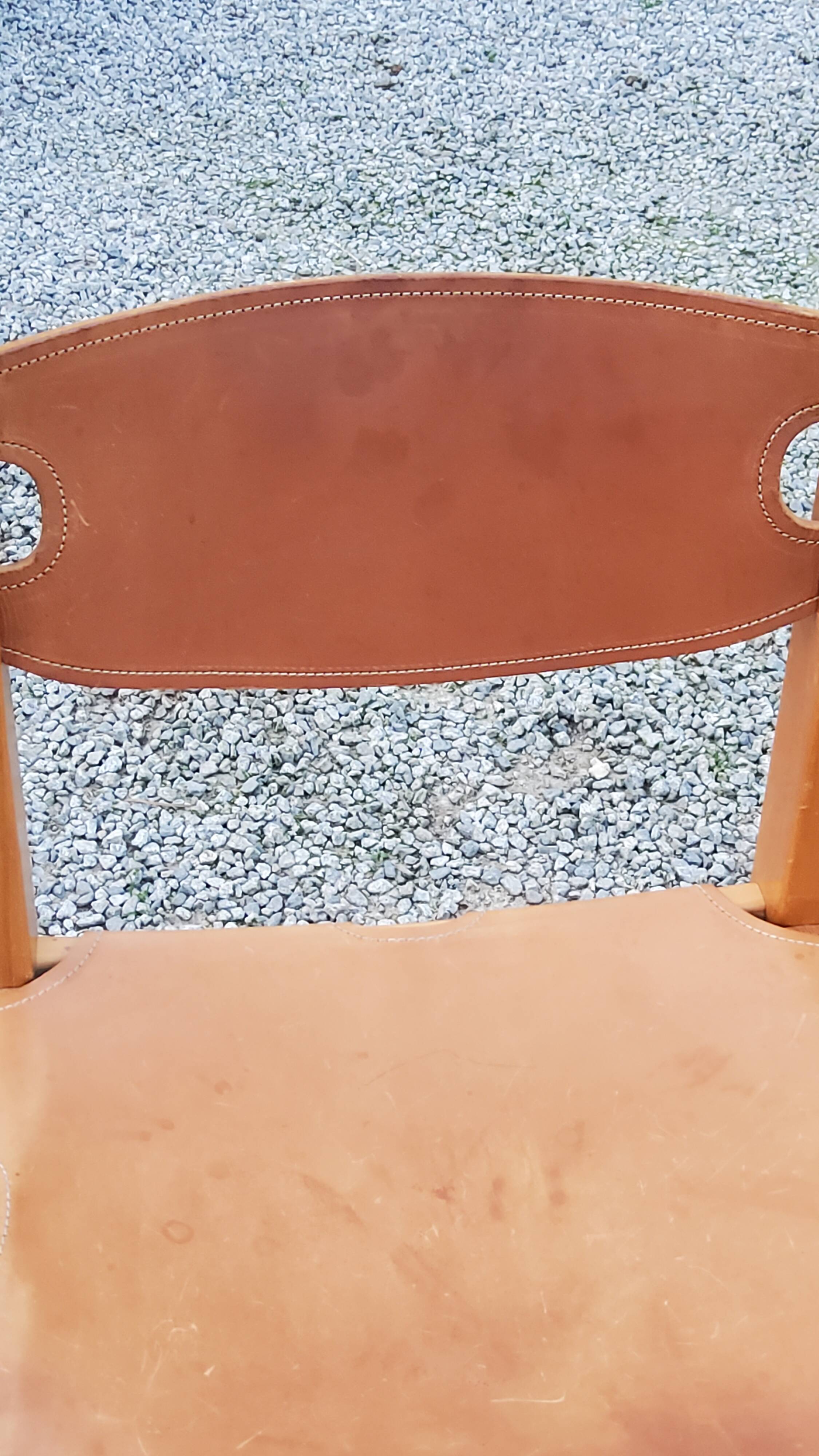 Pair of brutalist chairs in elm and stretched leather with saddle stitching Self publisher