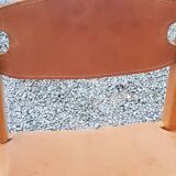 Pair of brutalist chairs in elm and stretched leather with saddle stitching Self publisher