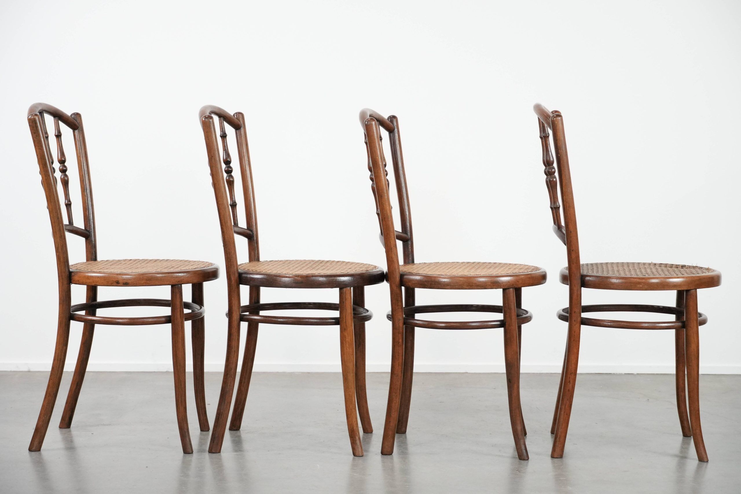 Set of 4 vintage bistro chairs Jacob & Josef Kohn Wien with a wicker seat