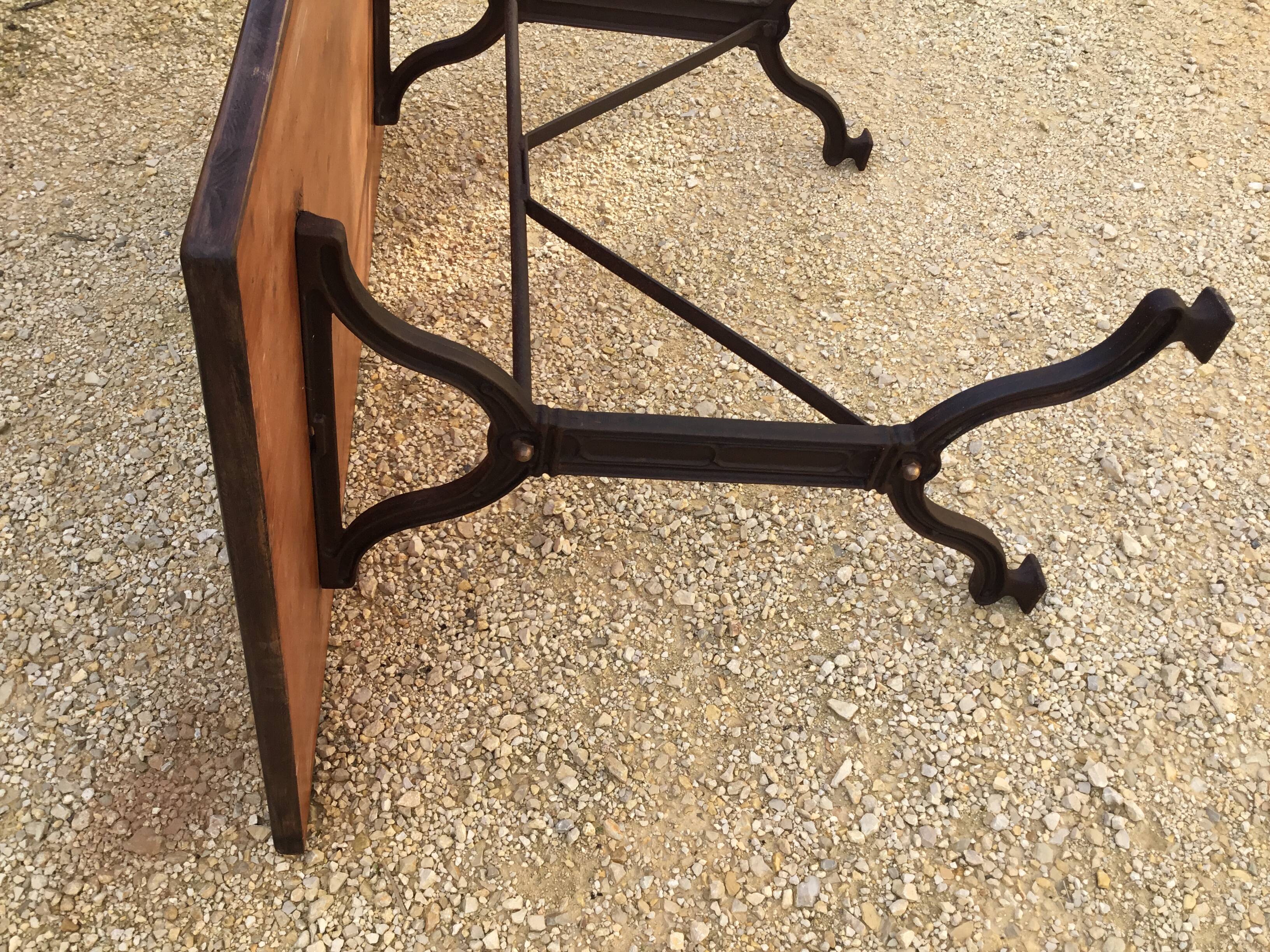 Cast iron and wood bistro table