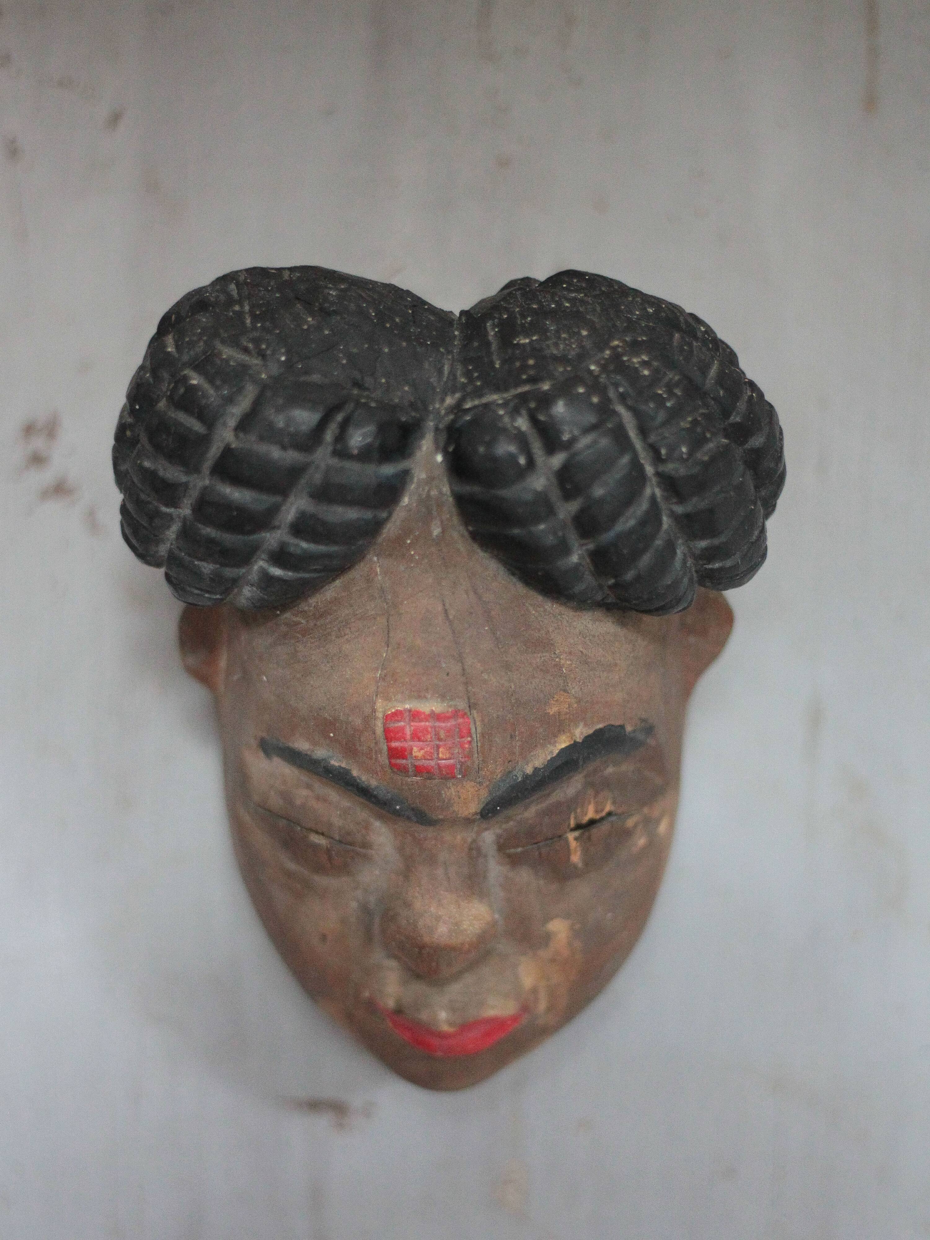 Ancient Okuyi mask, Punu mask from Gabon, carved wood, collection, ethnic art.