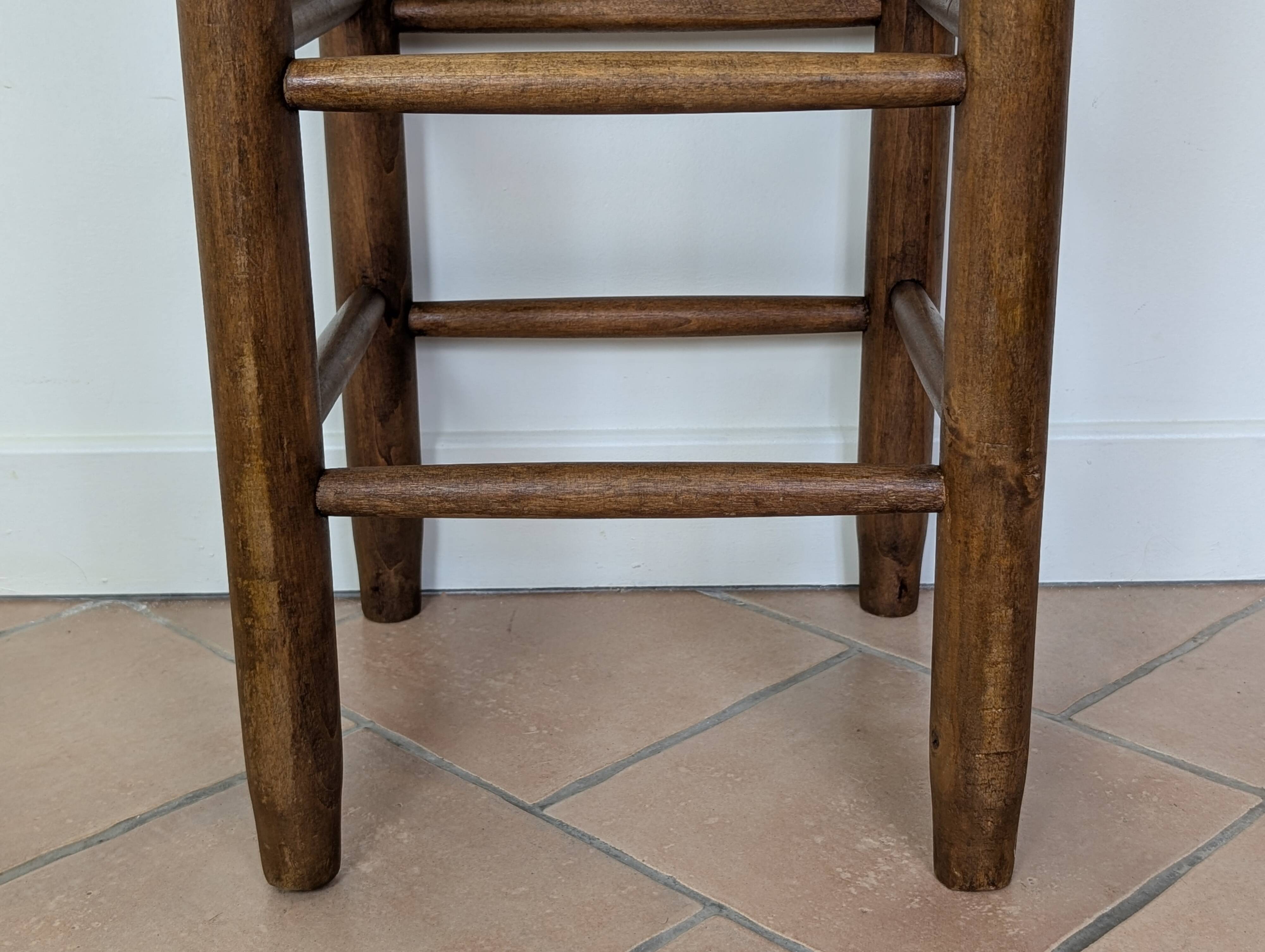 High wooden and straw stools