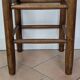 High wooden and straw stools