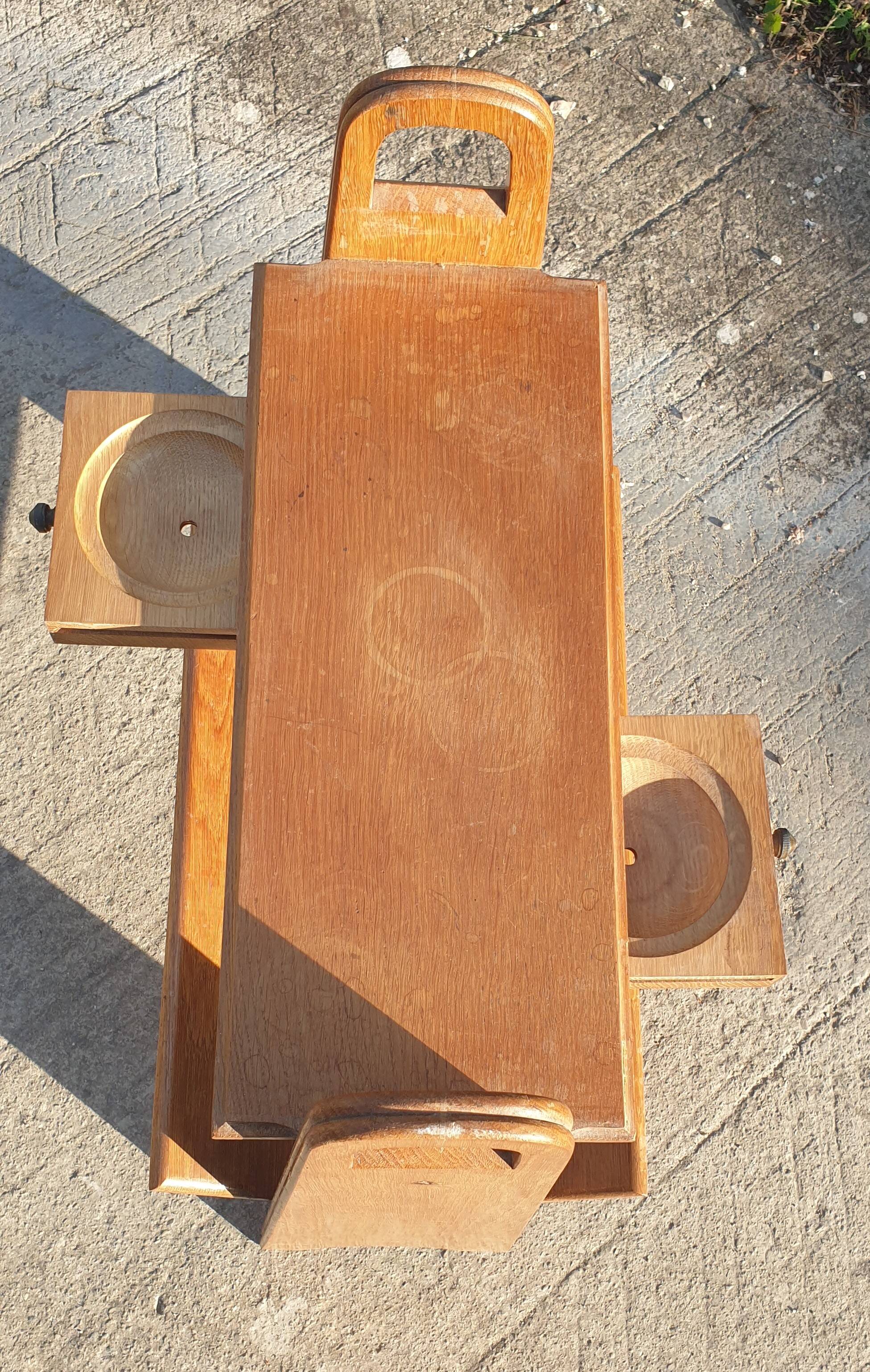 Magazine rack with sliding drawers in light wood, Scandinavian style.