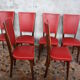 Lot de 8 chaises vintage bois et skai rouge