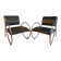 Pair of chrome and faux leather armchairs