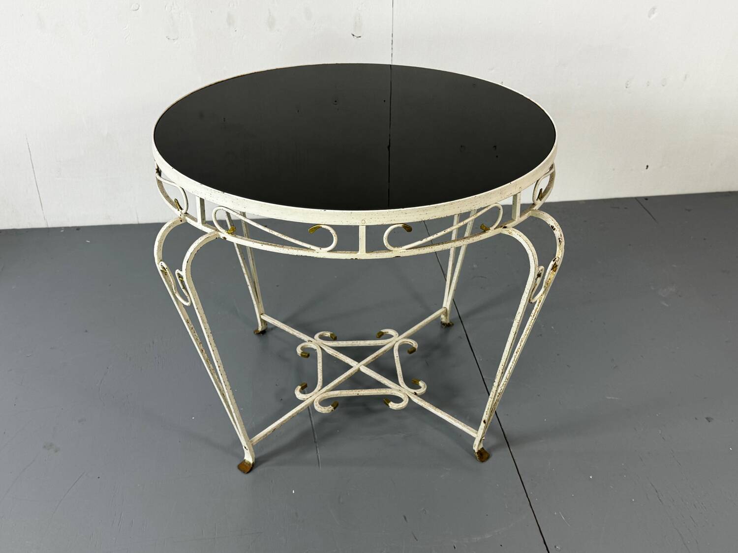 Side table in iron and glass in French Regency style, 1950s.