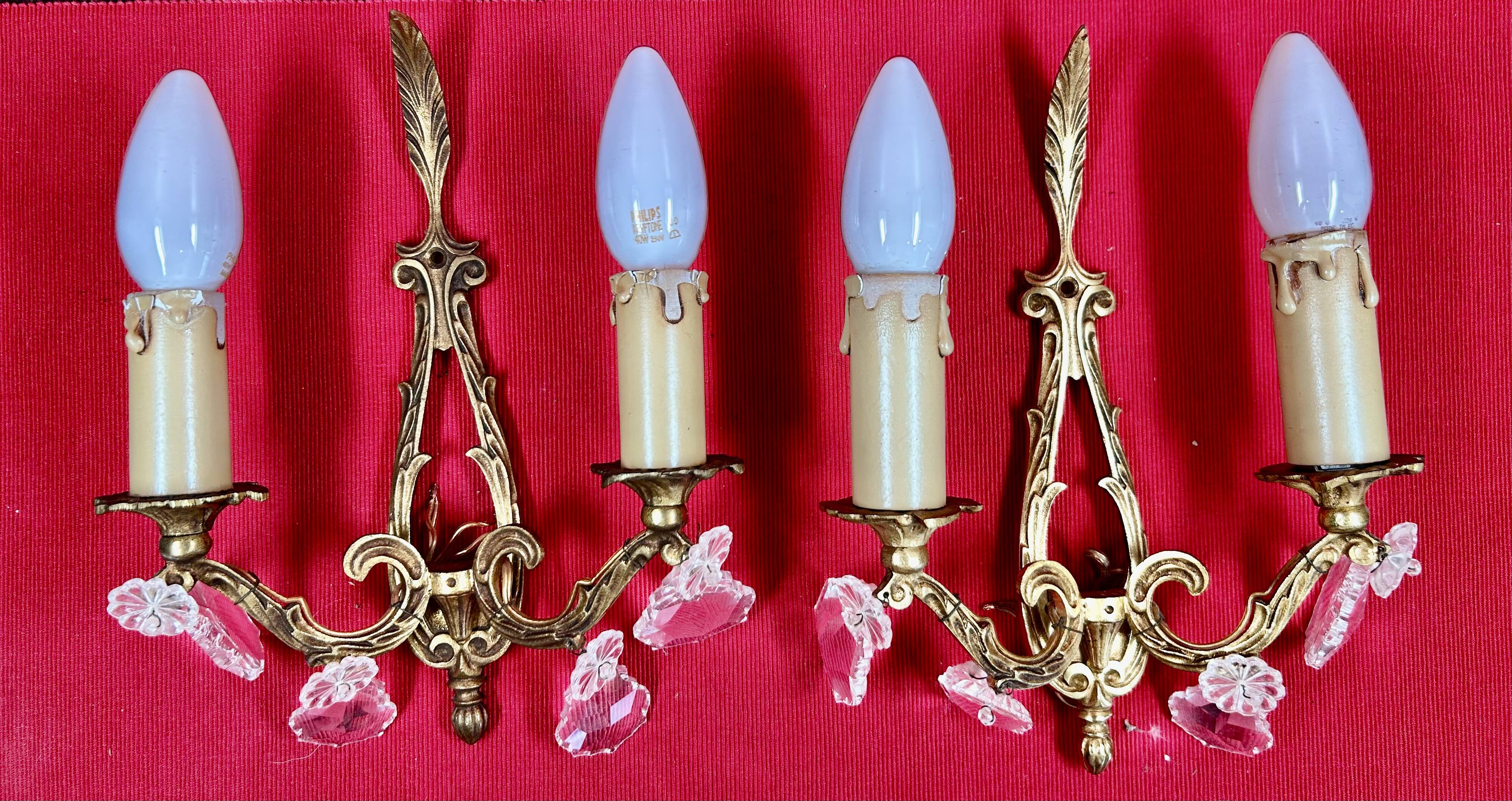 Pair of Louis XVI style wall lights, gilded bronze