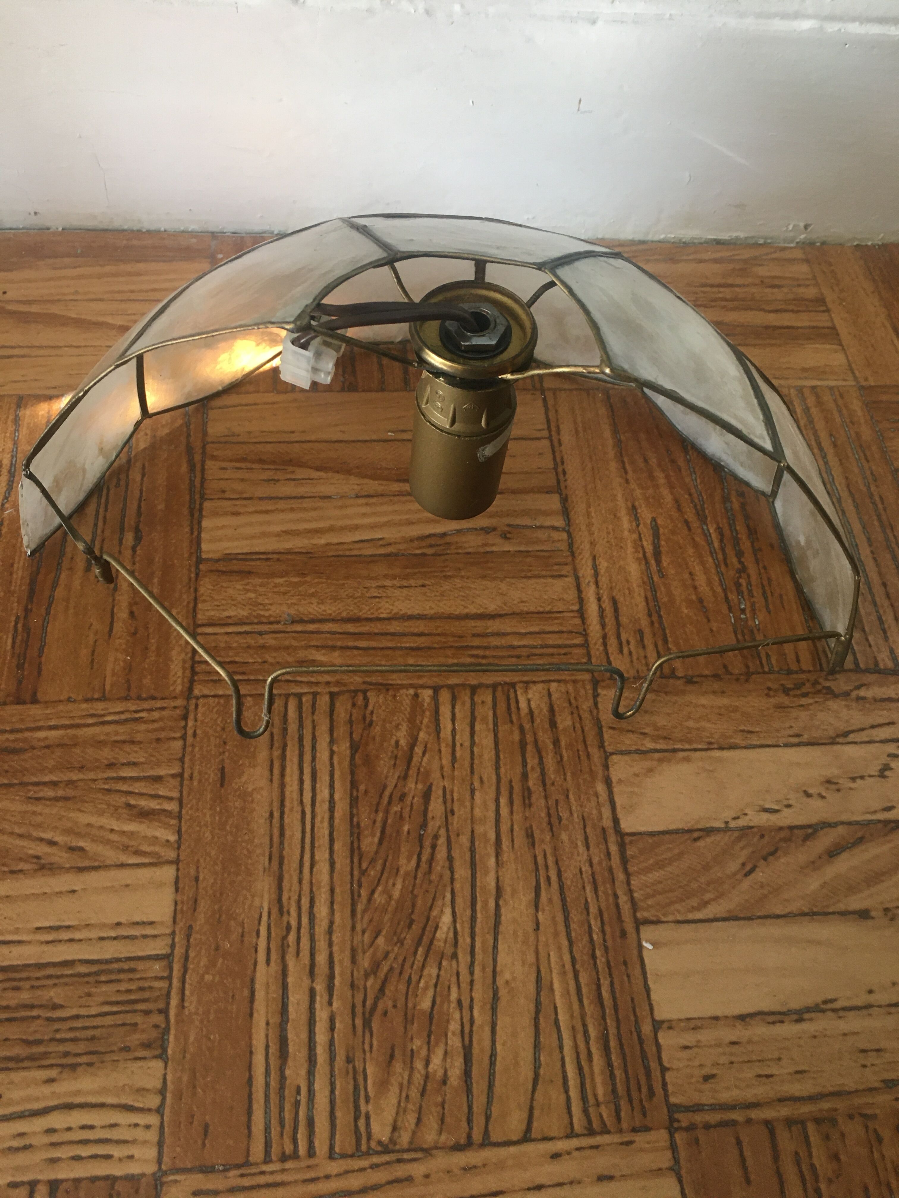 Mother-of-pearl and tin wall lamp