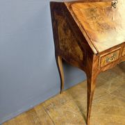 Louis XV slant-top desk in 18th-century marquetry.
