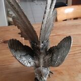 2 silver metal roosters