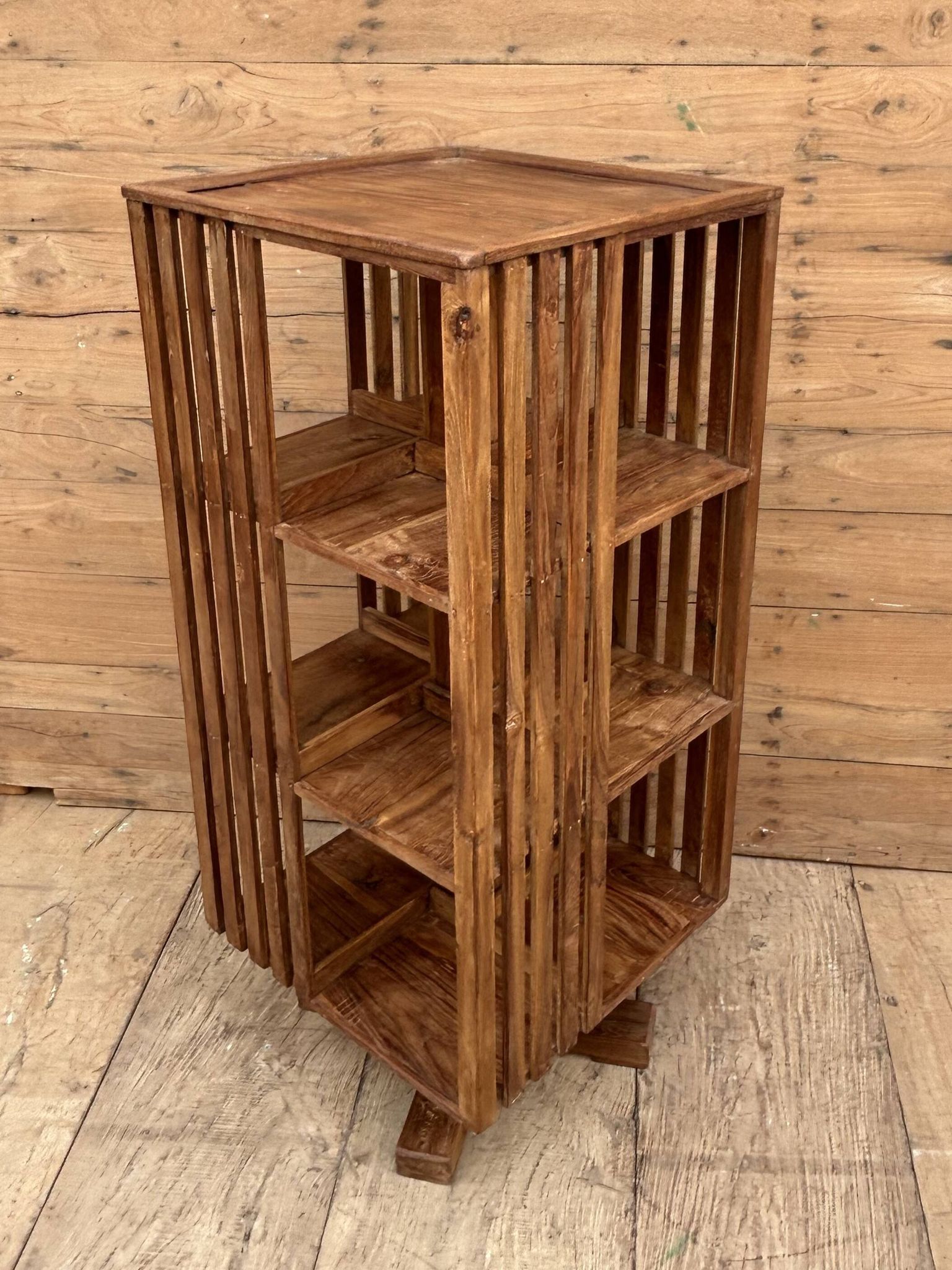rotating library in Burmese teak