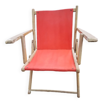 Fauteuil de jardin ancien en bois et tissu rouge