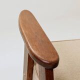 Mid-century modern armchair in camel wool with oak wood.