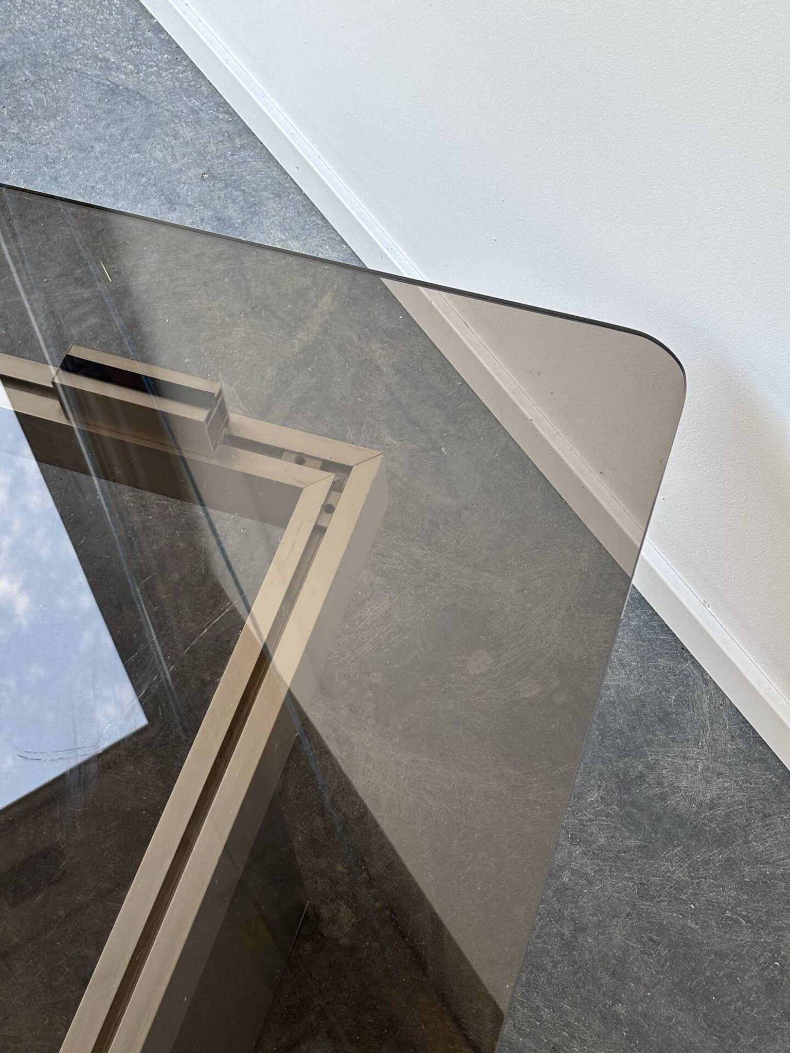 Large modernist coffee table in aluminium and smoked glass, 1970.
