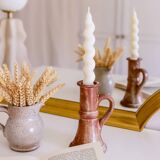 2 terracotta candlesticks, can also be used as a soliflore.