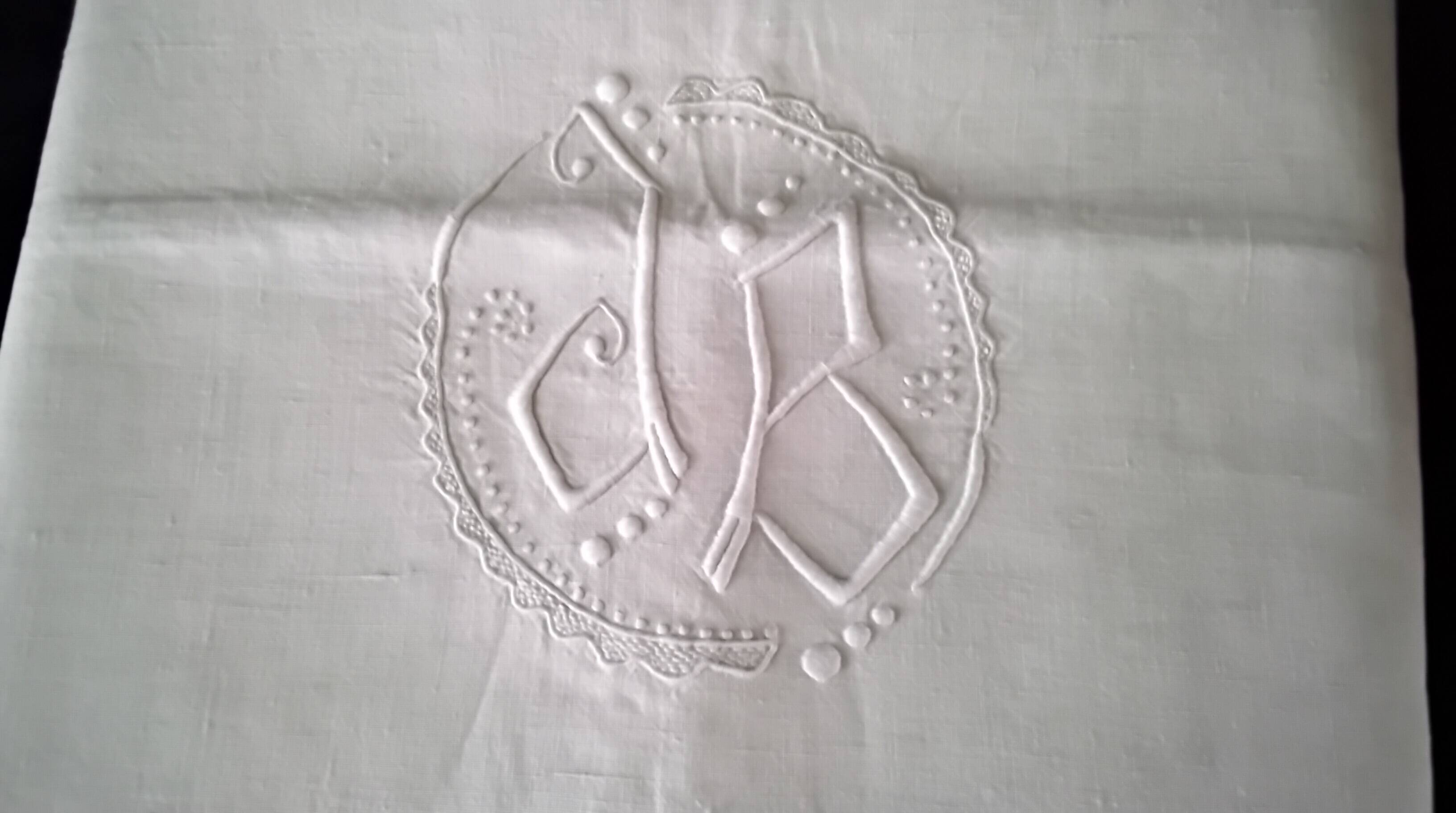Vintage linen curtain monogrammed JB, embroidered with polka dots and ladder stitches on the return.