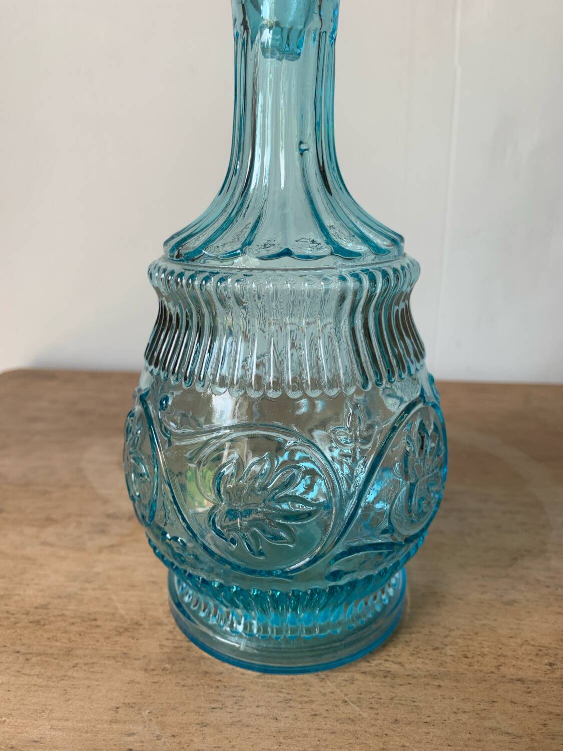 Old turquoise blue molded glass carafe