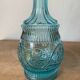 Old turquoise blue molded glass carafe