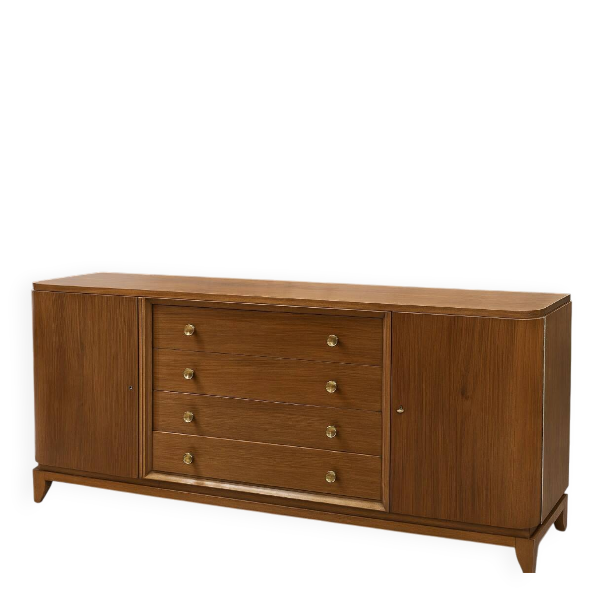 According to André Arbus, a sideboard in a row from the Art Deco period in blonde mahogany.