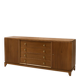 According to André Arbus, a sideboard in a row from the Art Deco period in blonde mahogany.