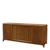 According to André Arbus, a sideboard in a row from the Art Deco period in blonde mahogany.
