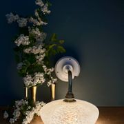 Vintage glass wall lamp with a curved arm from Clichy, white.