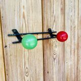 Vintage wall coat rack with 2 red and green wooden hooks