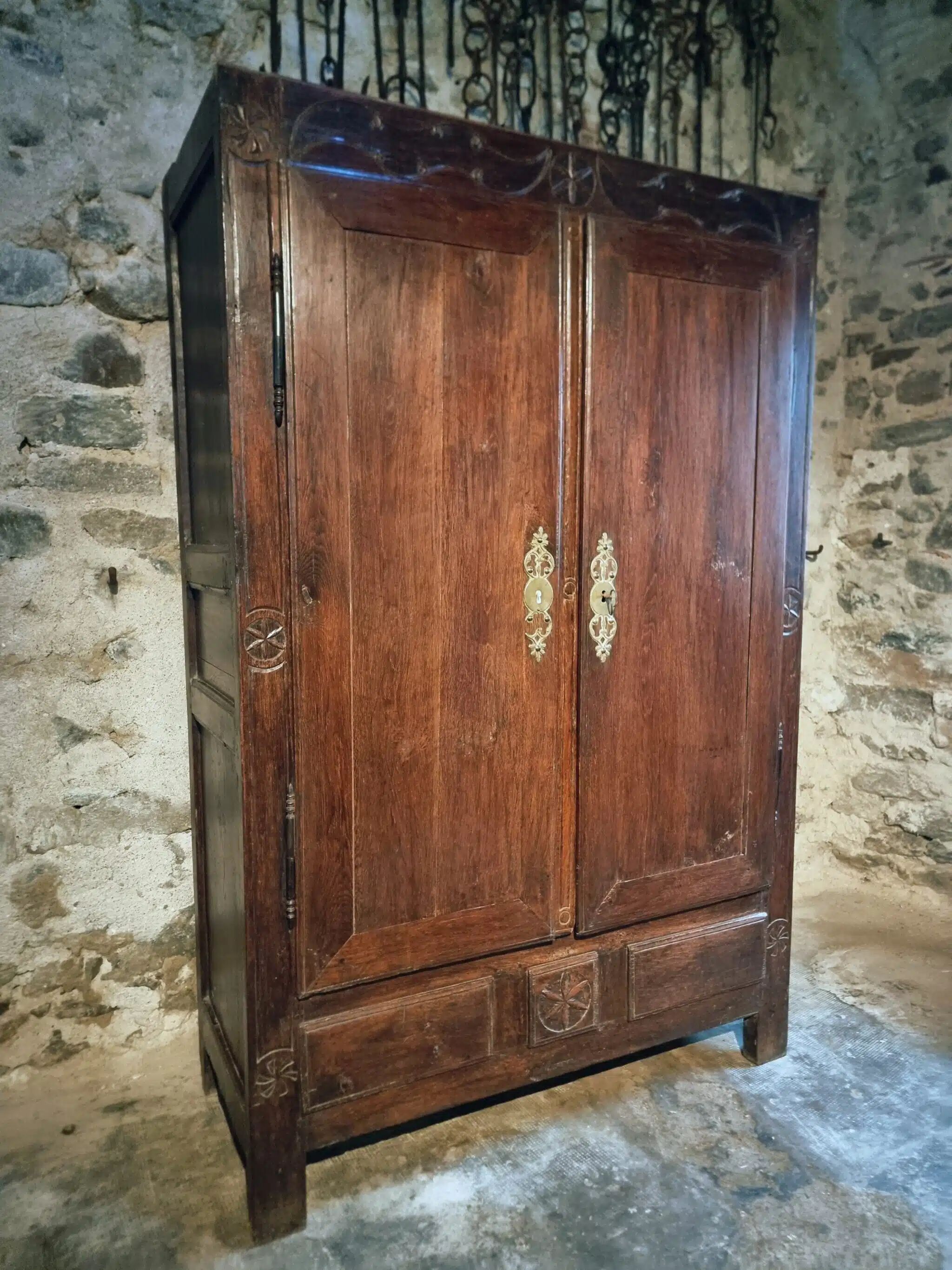 French oak armoire, late 17th - early 18th century, Louis XIV provincial style with hand-carved rosettes