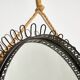 Miroir à cadre métallique