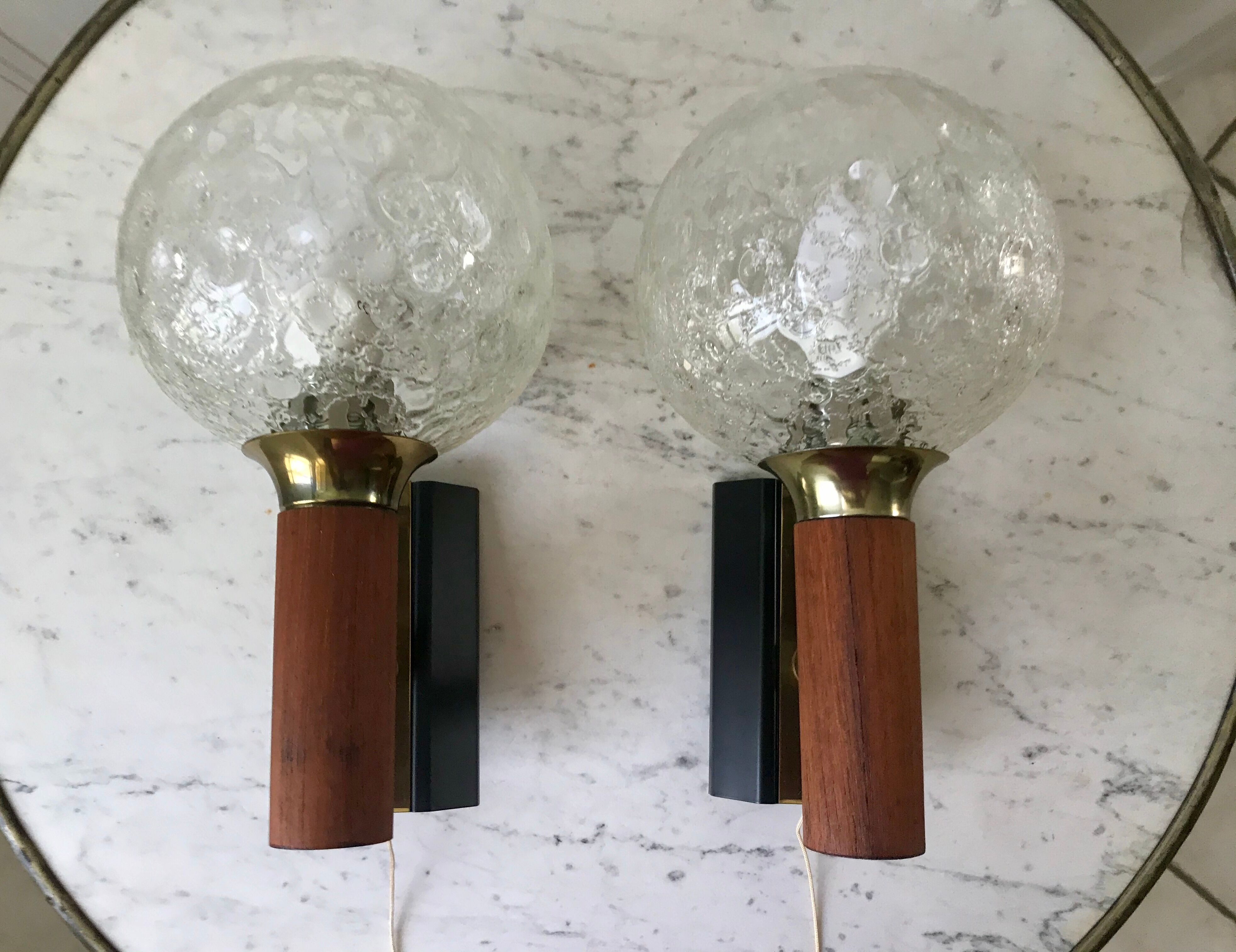 Pair of wall sconces balls in blown glass, metal and teak style 50s